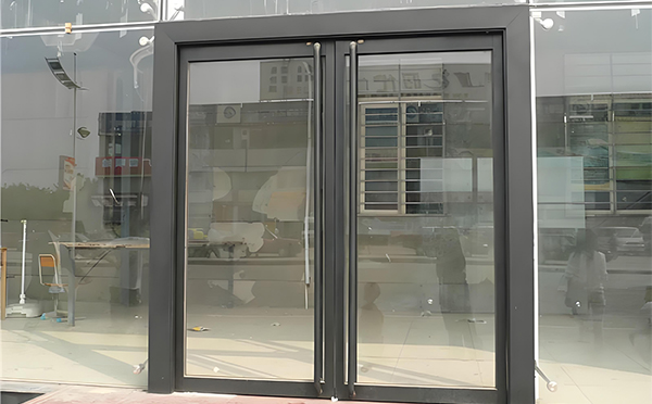 五家渠玻璃地弹门
